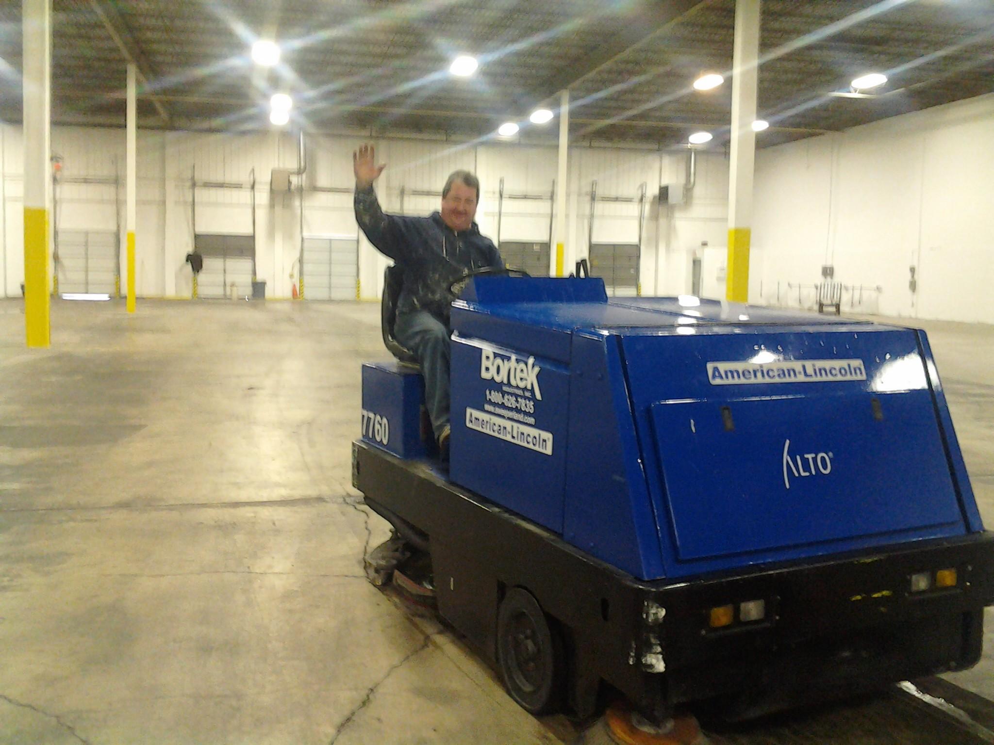 Auto Scrubber on Concrete Flooring